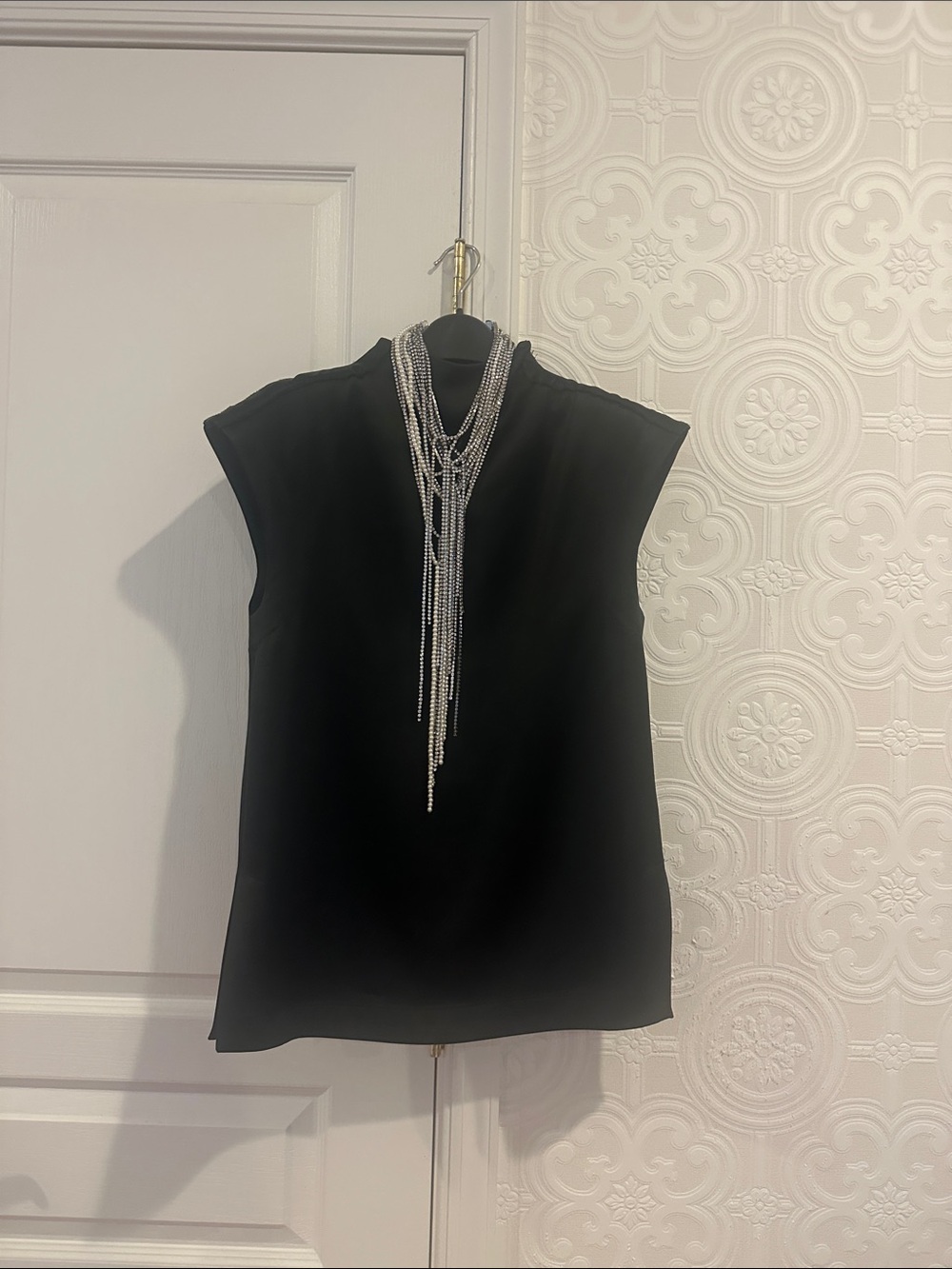 Zara Black Sleeveless Mock Neck Top with matching necklace